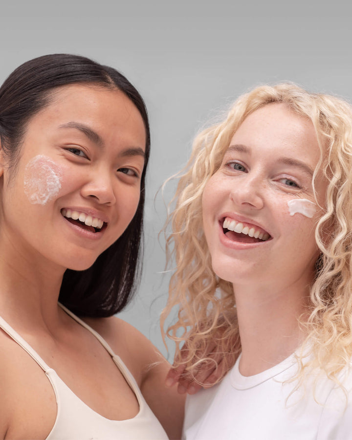 Girl with skincare products on their faces 